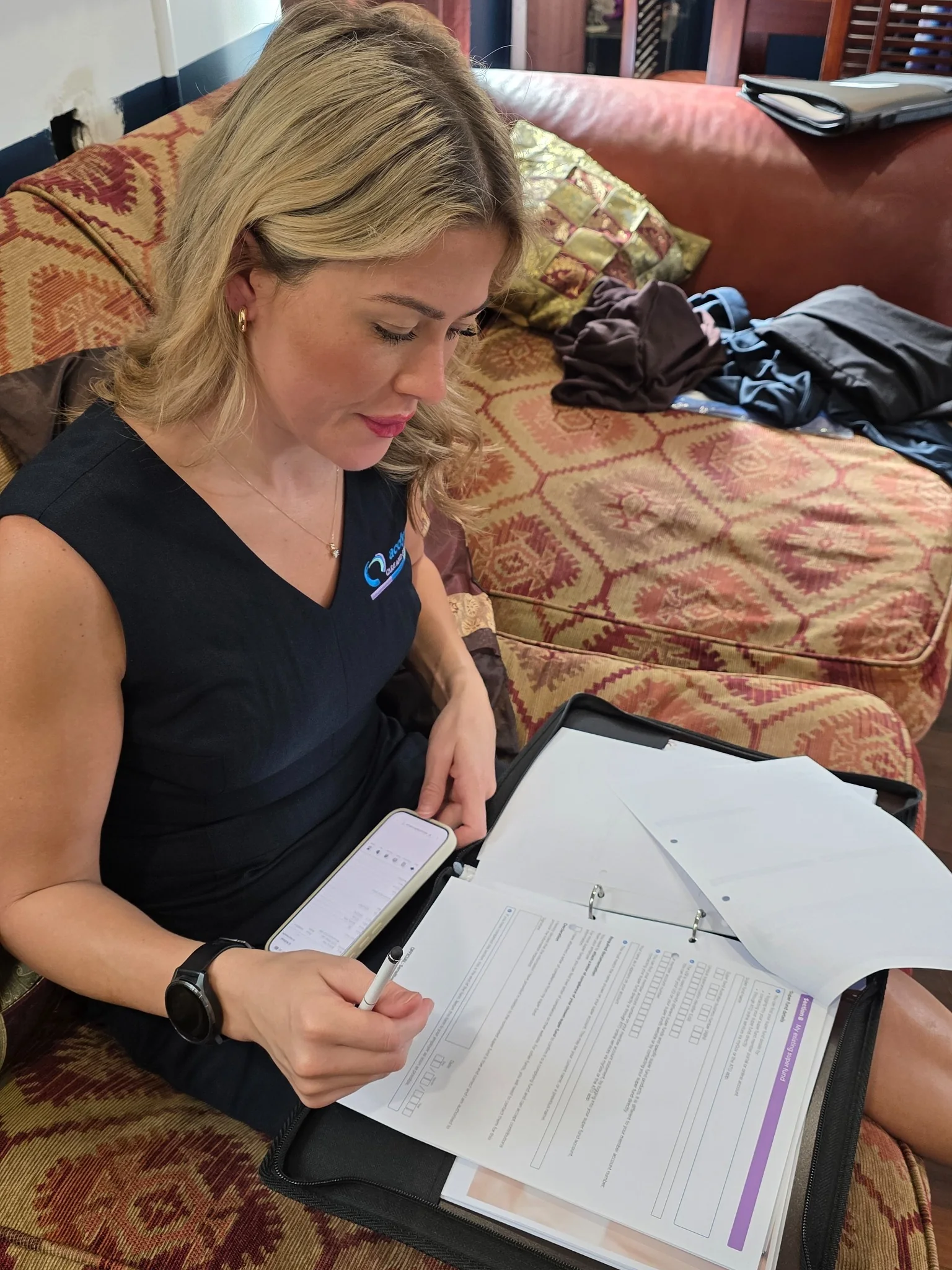 Acclyptic staff member reviewing a care plan