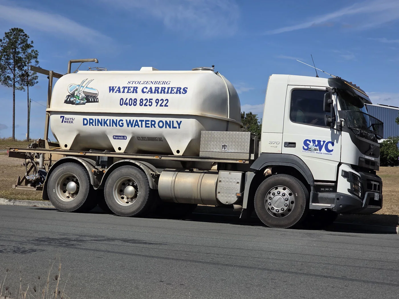 A water truck outside the busy Glenwood highway store